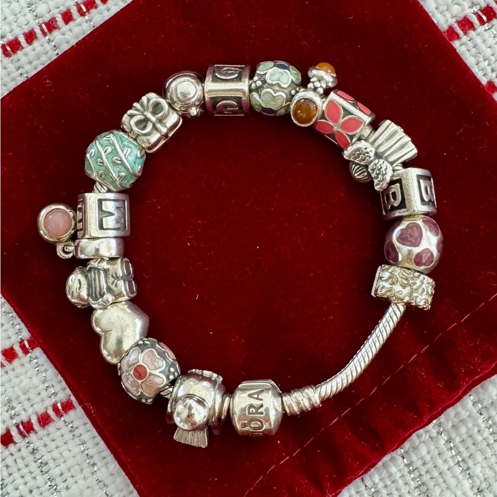 Pandora Silver Charm Bracelet with Intricate Designs